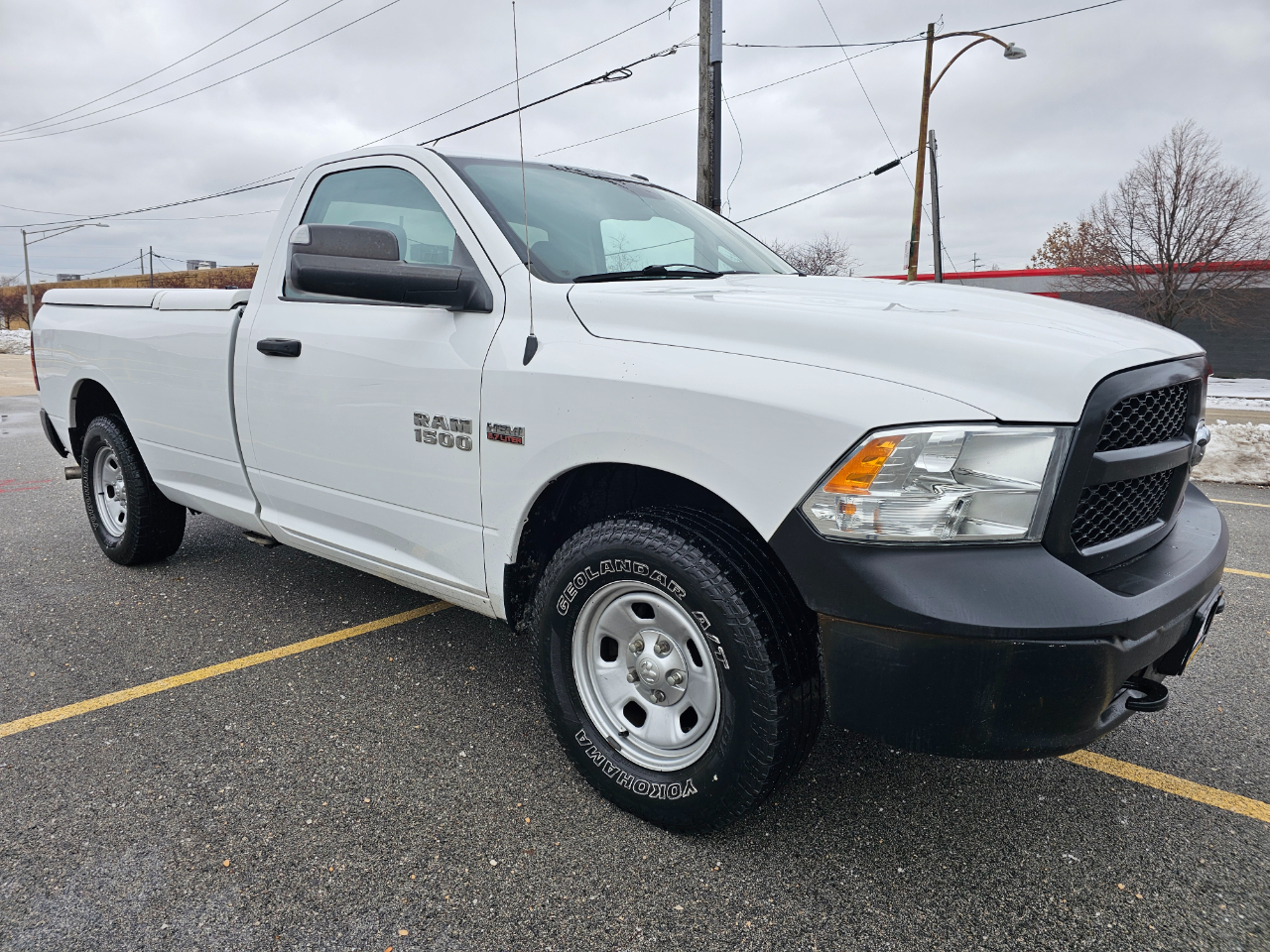 2015 RAM 1500 4WD Reg Cab 140.5" Tradesman's photo