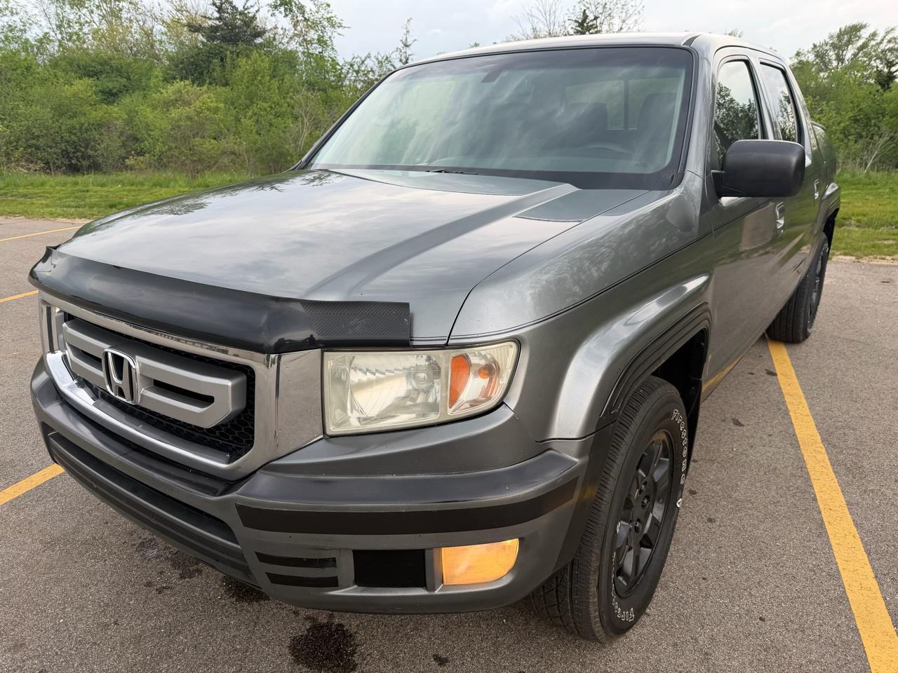 2009 Honda Ridgeline 3.5 Auto RTL w/Leather and Navi's photo