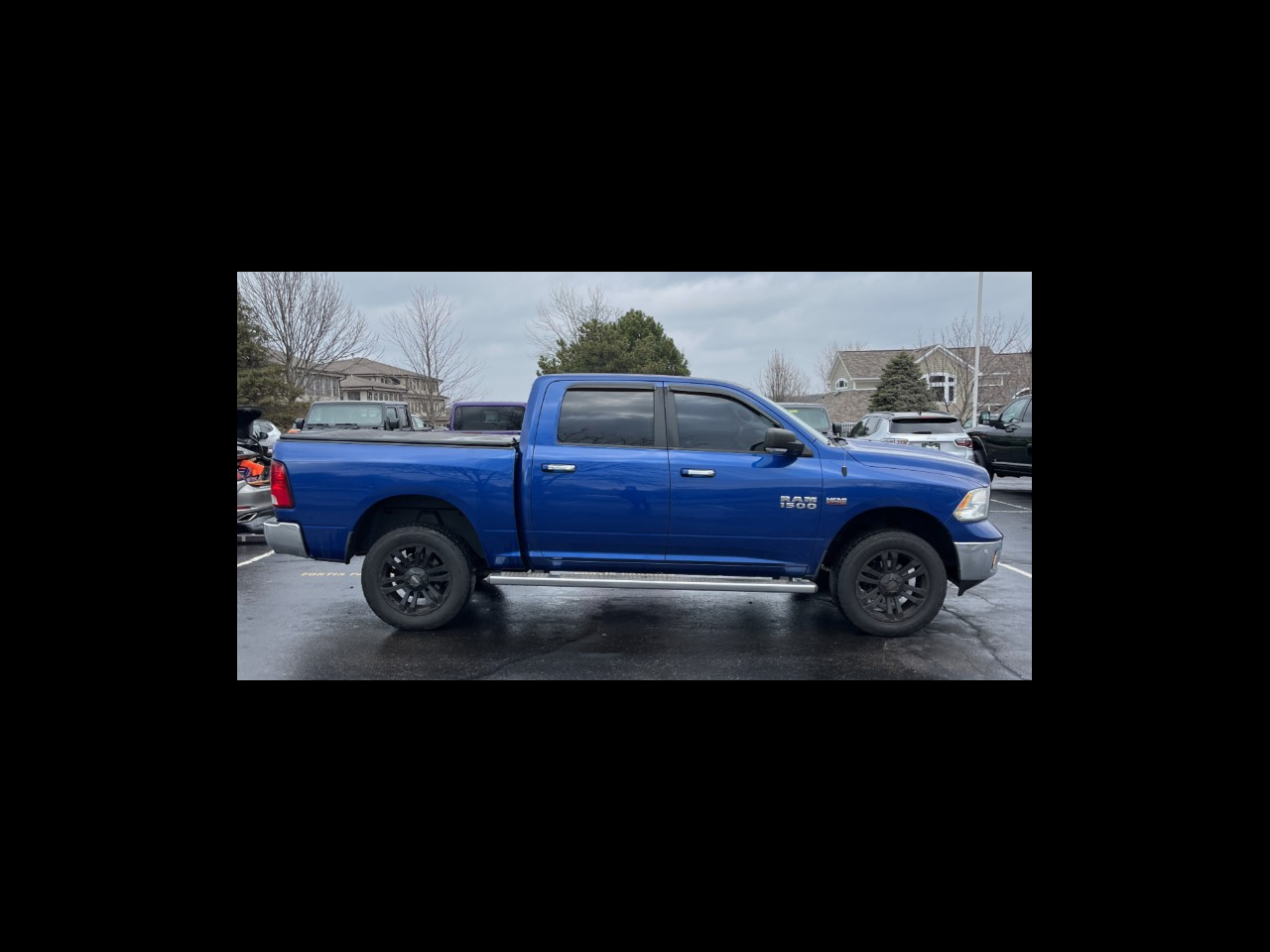 2014 RAM 1500 4WD Crew Cab 140.5" Big Horn's photo