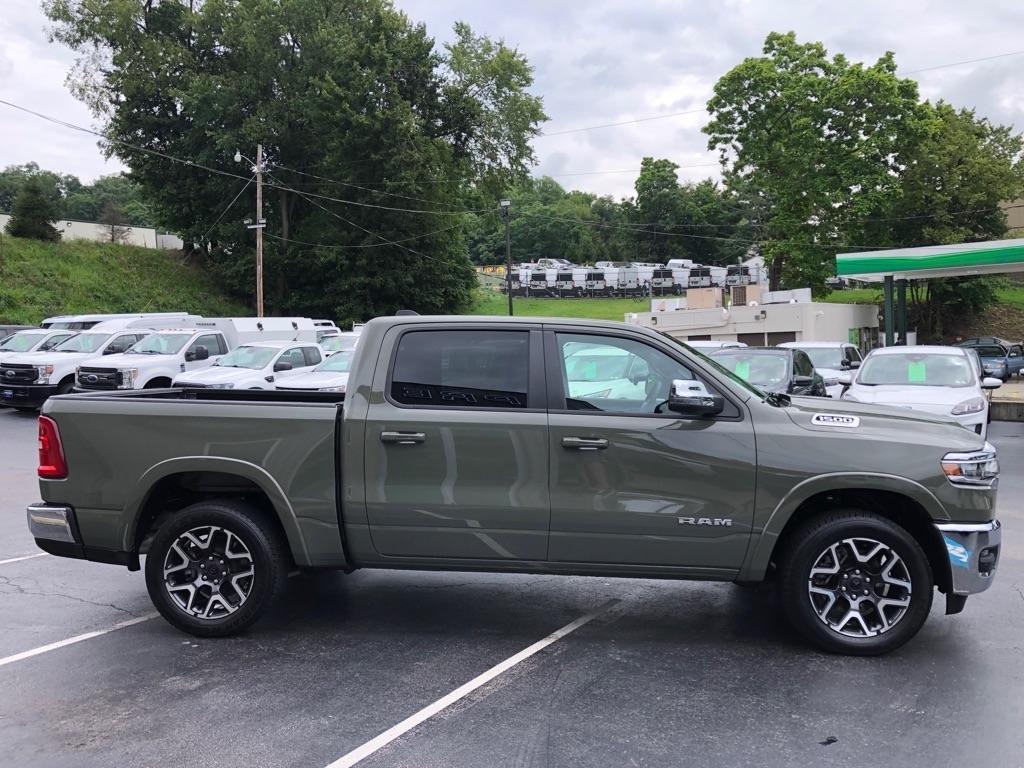 2026 RAM 1500 LARAMIE GREEN at Premiere Auto Sales