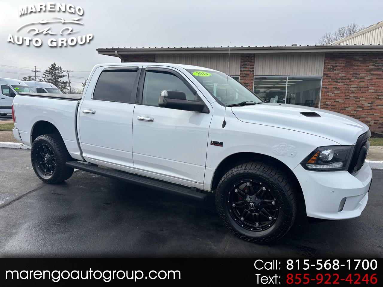 2014 RAM 1500 4WD Crew Cab 140.5" Longhorn Limited's photo