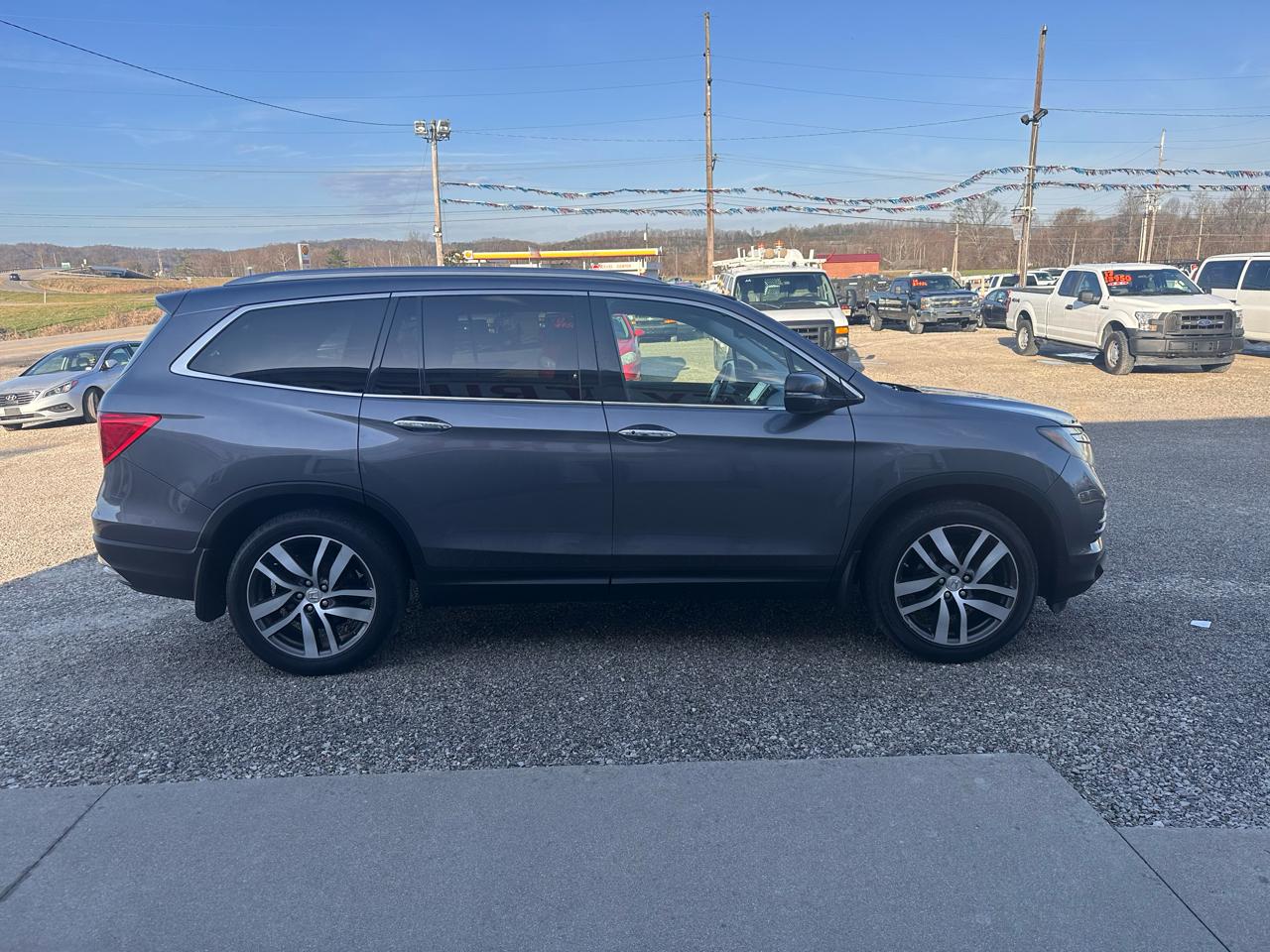 Honda Pilot AWD 4dr Elite w/RES & Navi 2016
