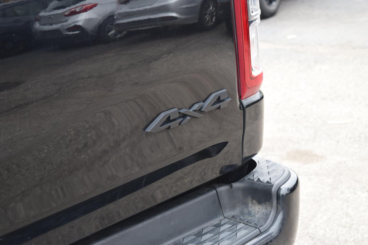 RAM 1500 Big Horn 4x4 Quad Cab 6'4" Box 2021