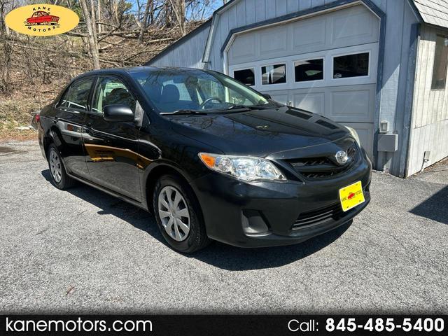 Black 2011 Toyota Corolla LE Sedan Front-Wheel Drive Automatic
