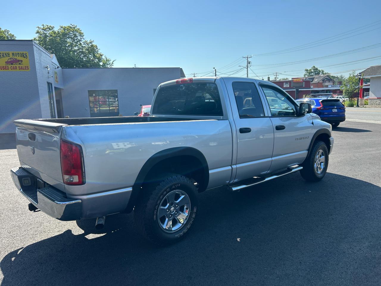 Dodge Ram 1500 4dr Quad Cab 140" WB 4WD SLT 2006
