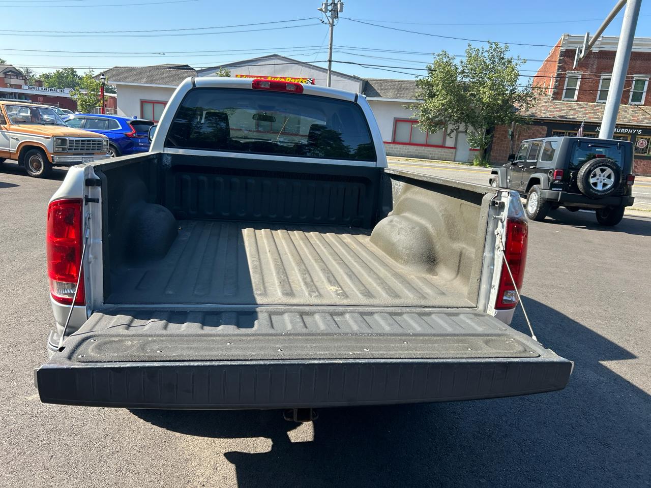 Dodge Ram 1500 4dr Quad Cab 140" WB 4WD SLT 2006
