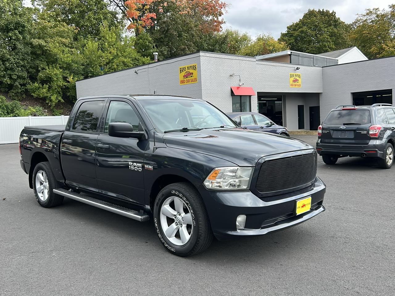 RAM 1500 4WD Crew Cab 140.5" Sport 2014