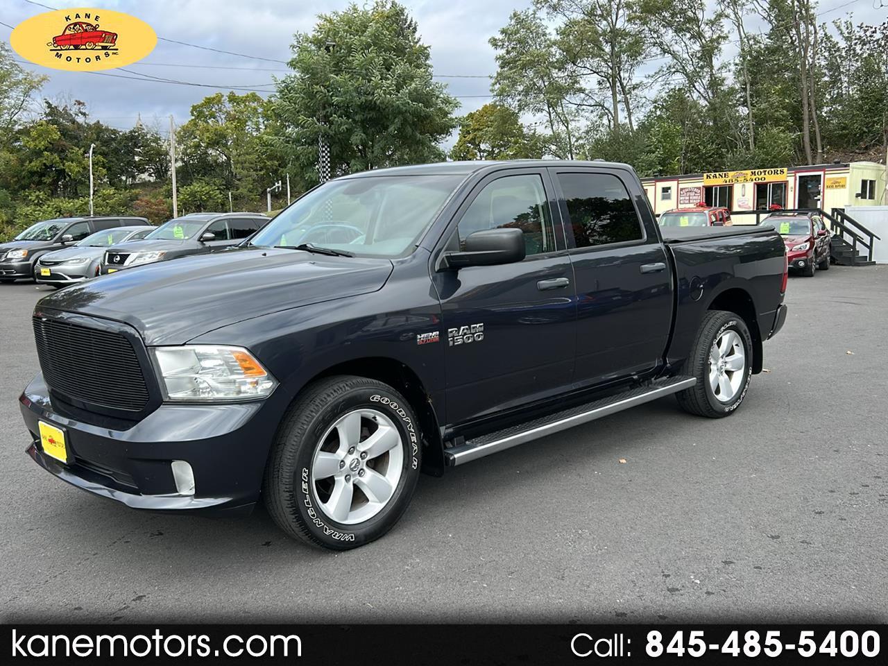 RAM 1500 4WD Crew Cab 140.5" Sport 2014