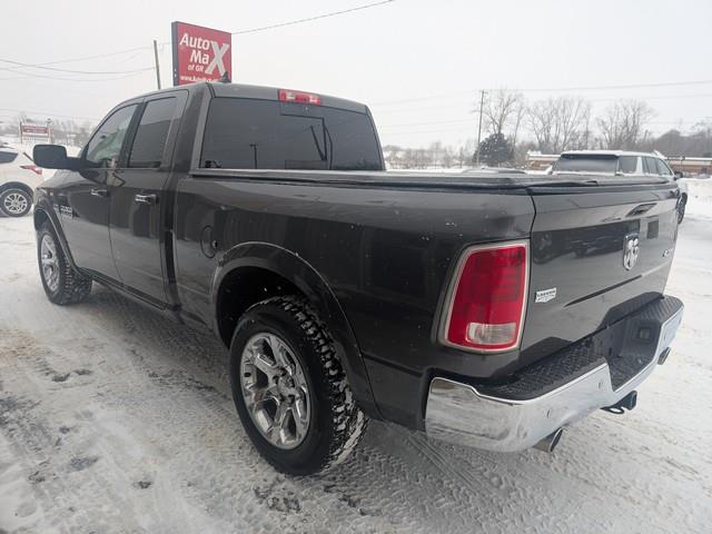RAM 1500 4WD Quad Cab 140.5" Laramie 2015