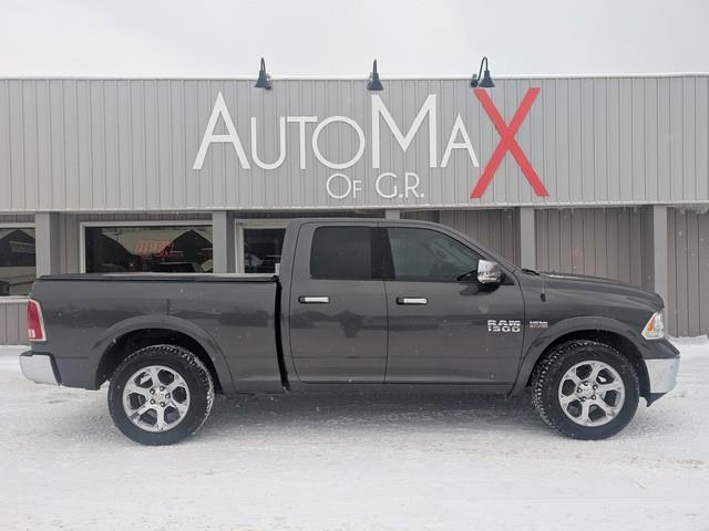 RAM 1500 4WD Quad Cab 140.5" Laramie 2015