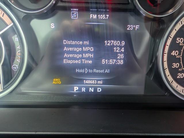 RAM 1500 4WD Quad Cab 140.5" Laramie 2015