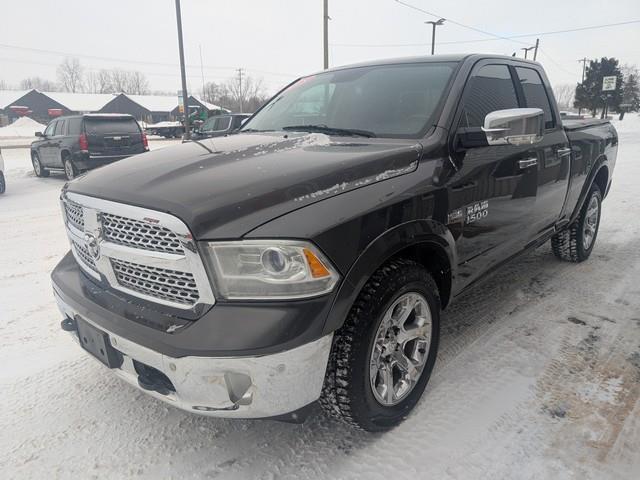 RAM 1500 4WD Quad Cab 140.5" Laramie 2015