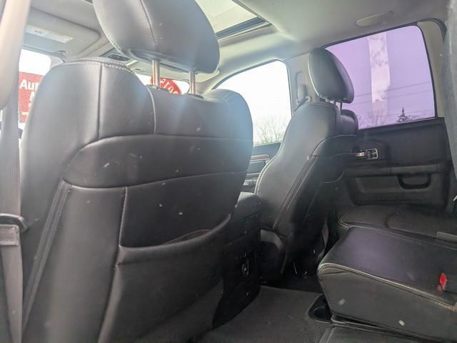 RAM 1500 4WD Quad Cab 140.5" Laramie 2015