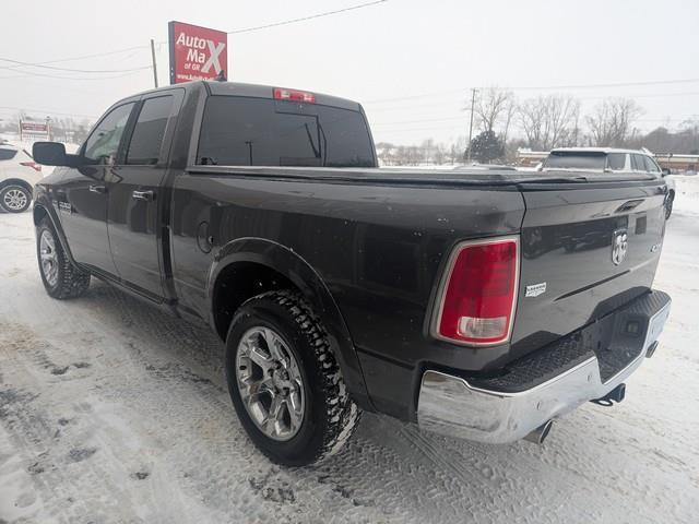 RAM 1500 4WD Quad Cab 140.5" Laramie 2015