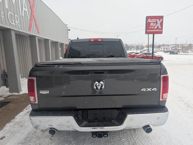 RAM 1500 4WD Quad Cab 140.5" Laramie 2015