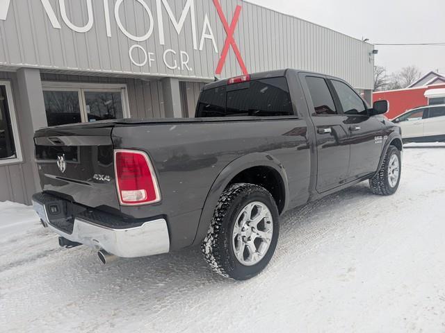 RAM 1500 4WD Quad Cab 140.5" Laramie 2015