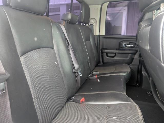 RAM 1500 4WD Quad Cab 140.5" Laramie 2015