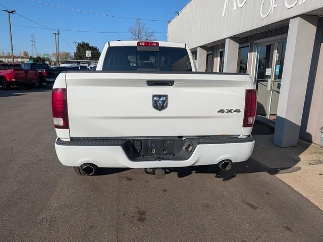 RAM 1500 4WD Quad Cab 140.5" Sport 2017