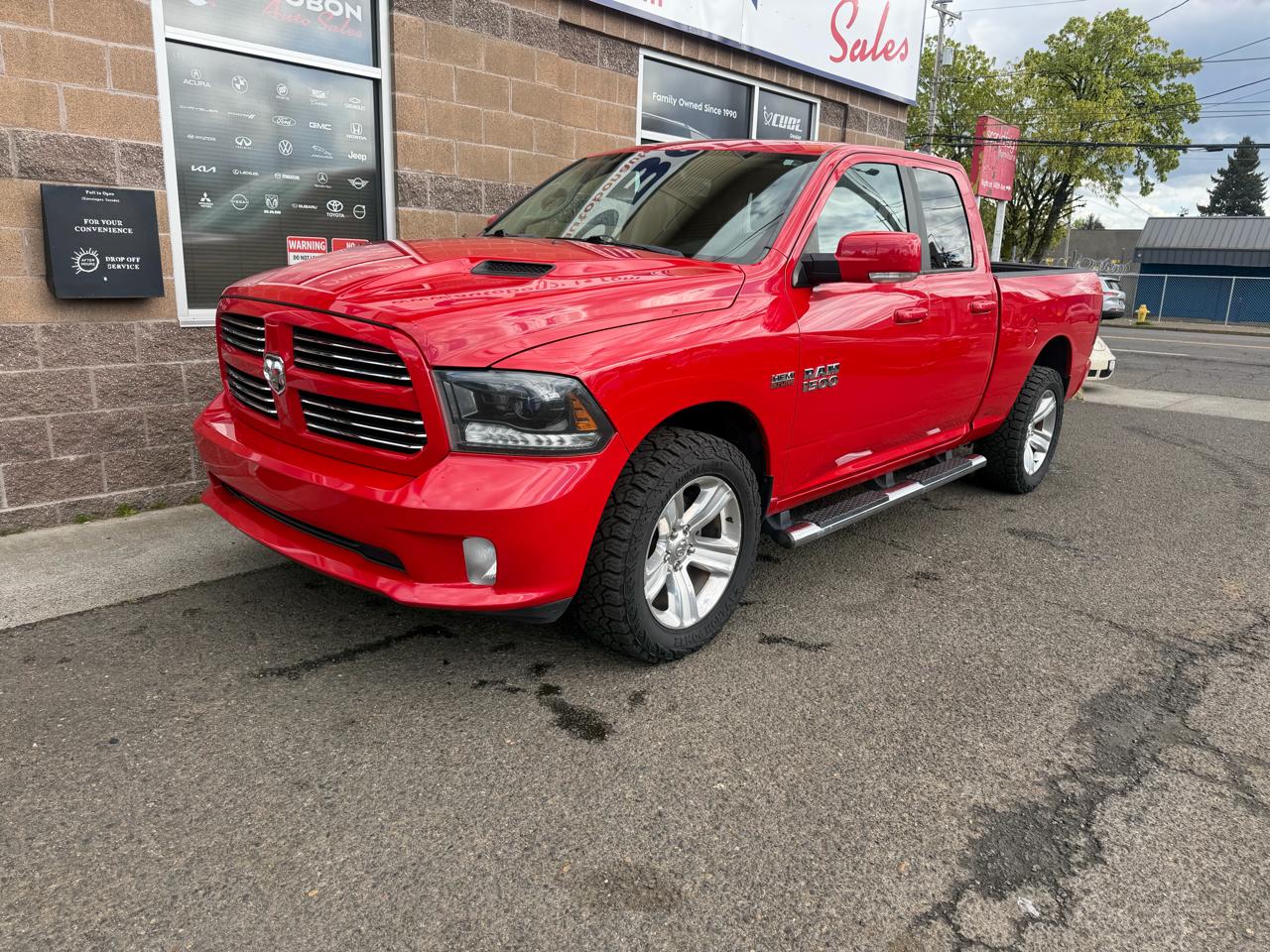 2015 RAM 1500 4WD Quad Cab 140.5" Sport
