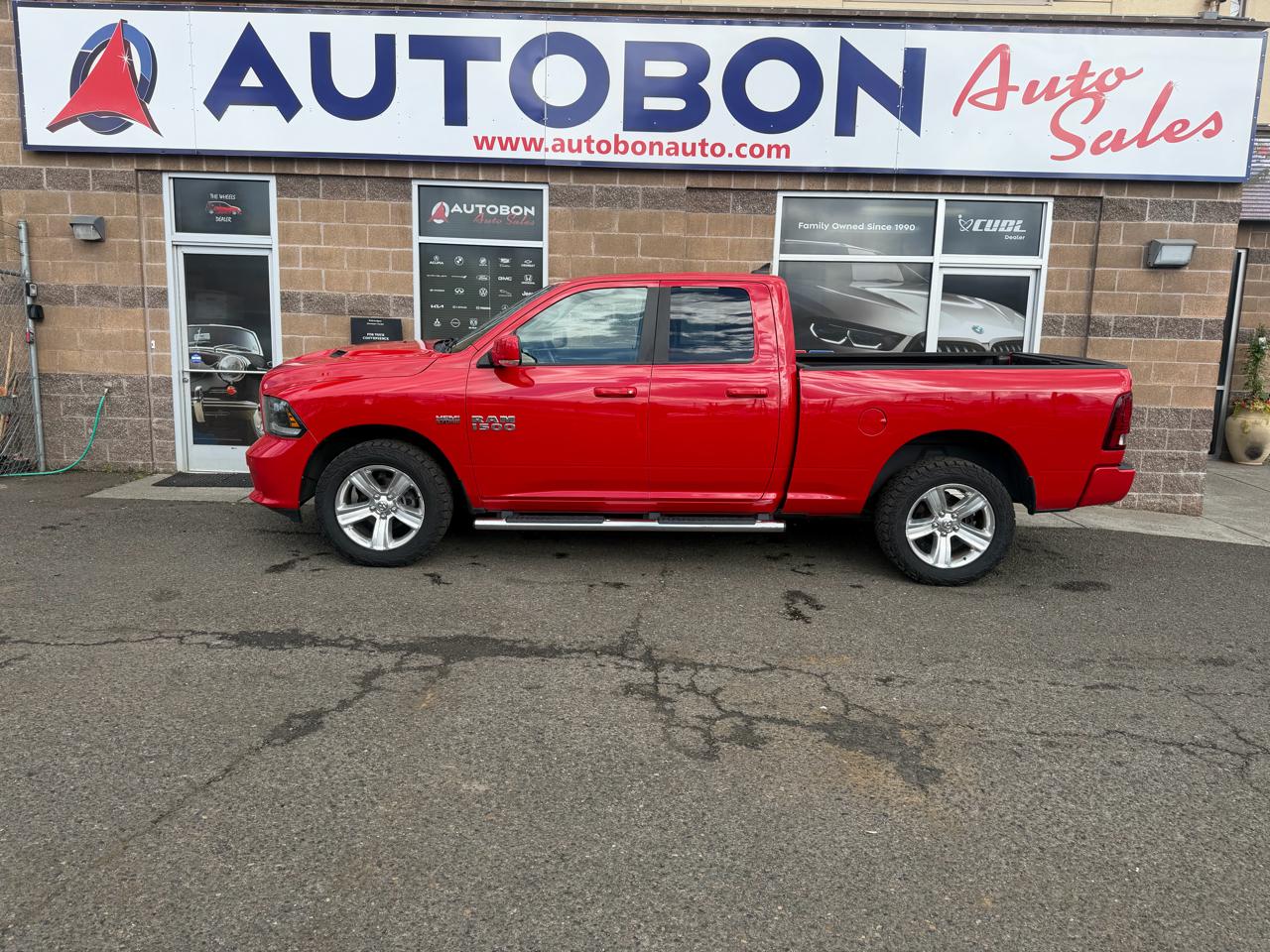 RAM 1500 4WD Quad Cab 140.5" Sport 2015