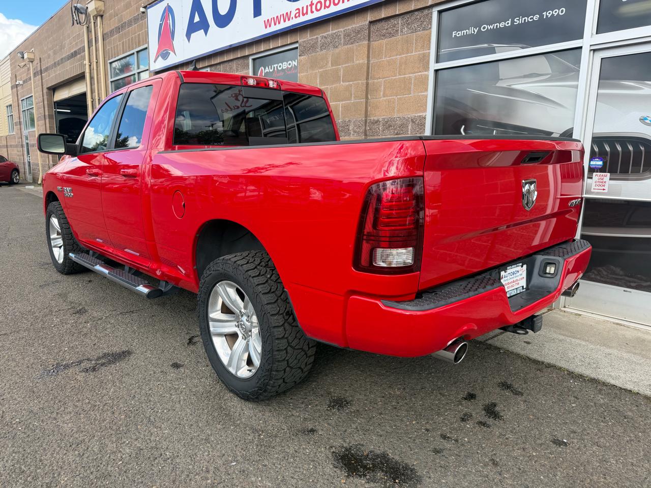 RAM 1500 4WD Quad Cab 140.5" Sport 2015