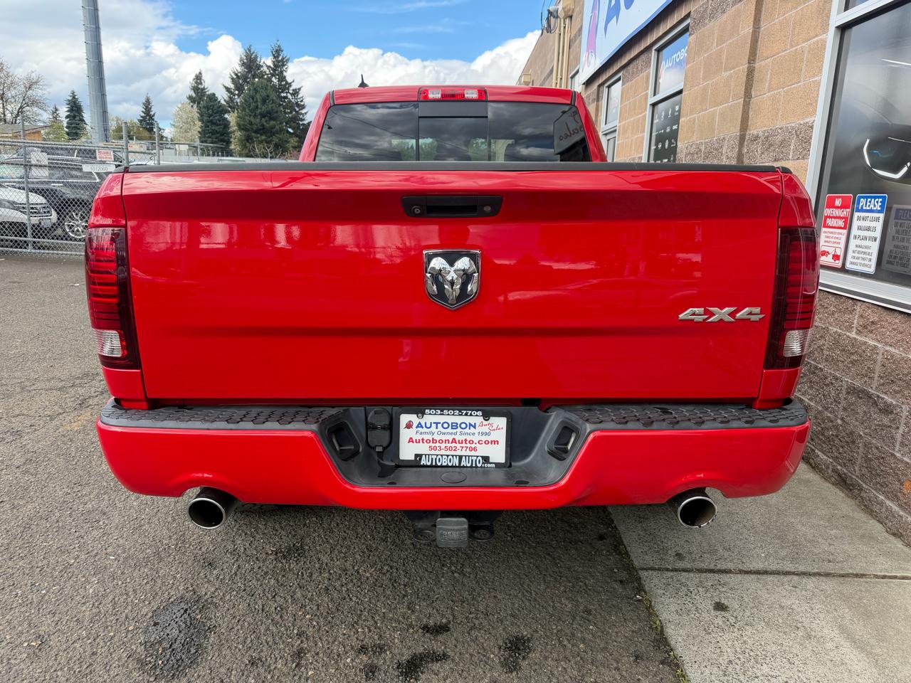 RAM 1500 4WD Quad Cab 140.5" Sport 2015