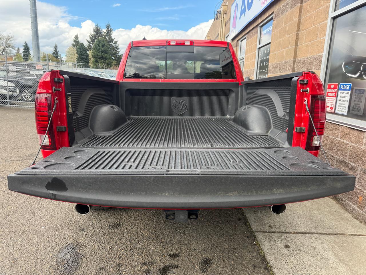 RAM 1500 4WD Quad Cab 140.5" Sport 2015