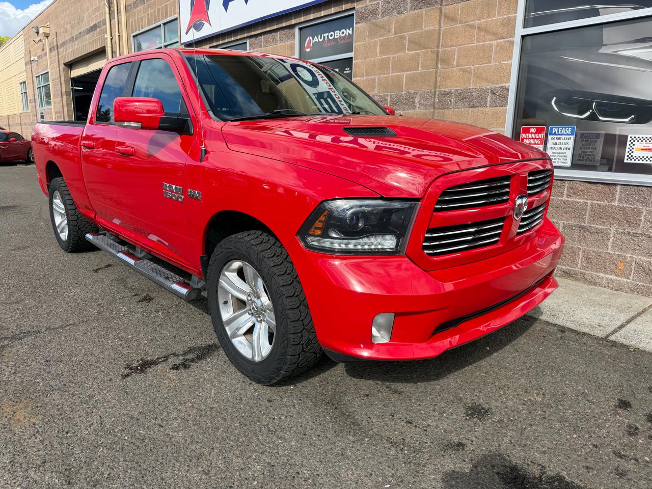 RAM 1500 4WD Quad Cab 140.5" Sport 2015
