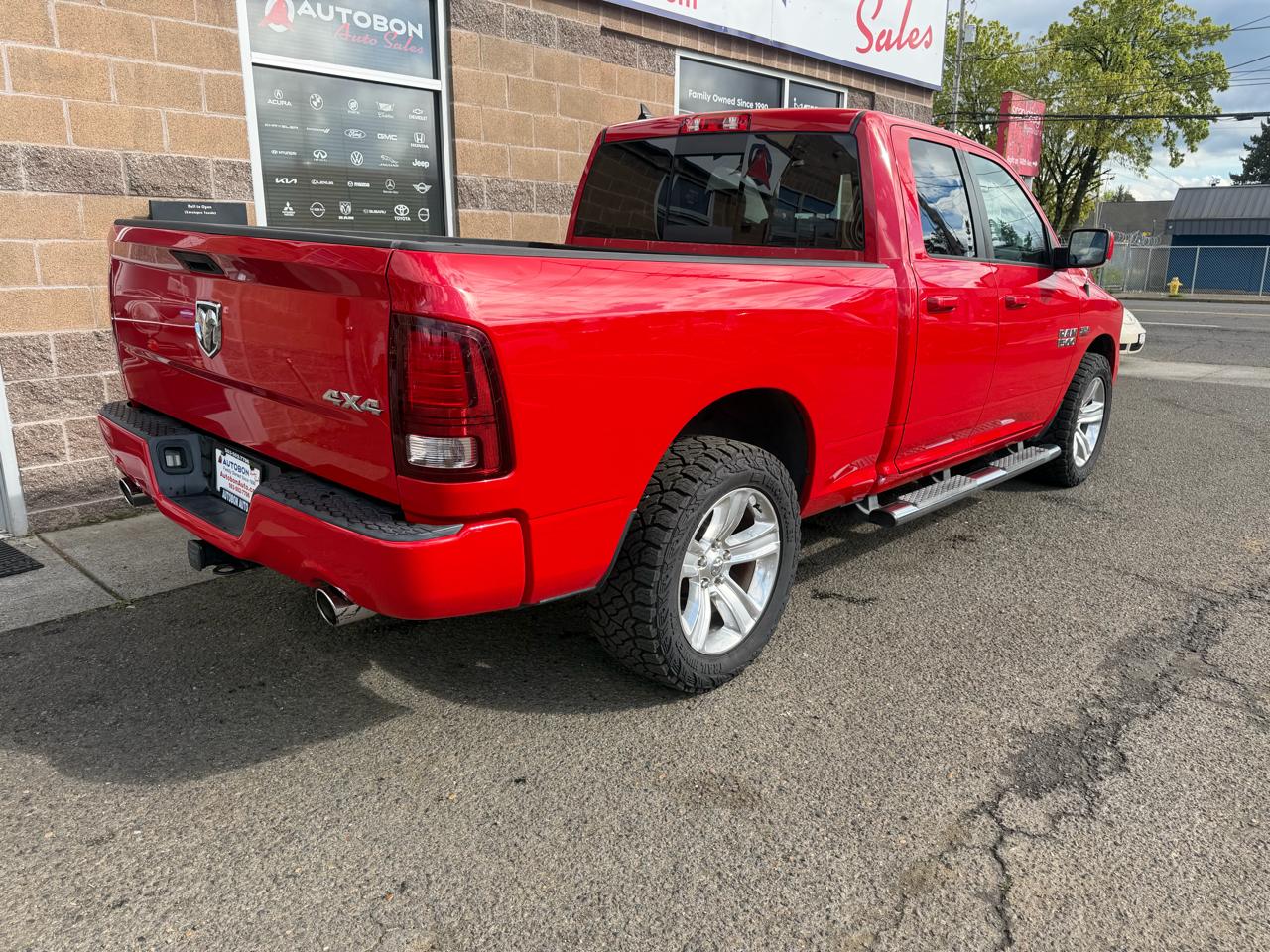 RAM 1500 4WD Quad Cab 140.5" Sport 2015
