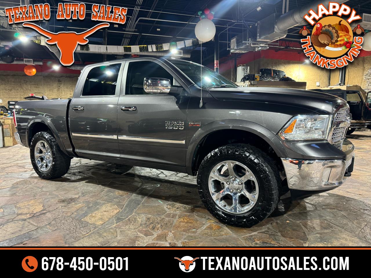 2015 RAM 1500 4WD Crew Cab 140.5" Laramie