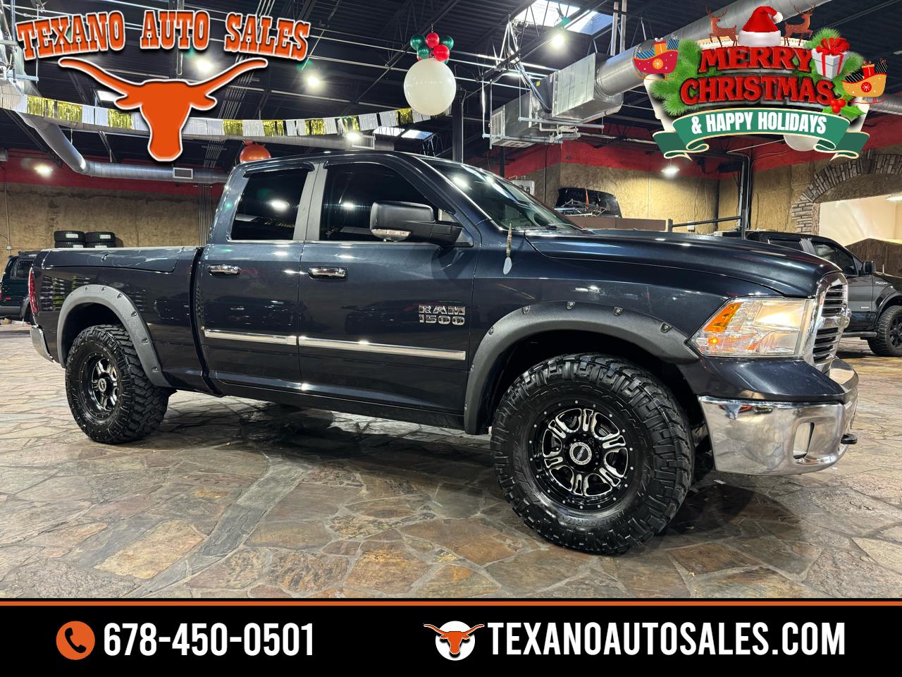 2013 RAM 1500 4WD Quad Cab 140.5" Big Horn