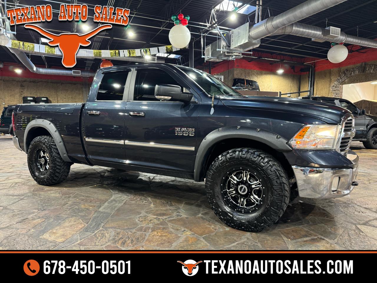 2013 RAM 1500 4WD Quad Cab 140.5" Big Horn
