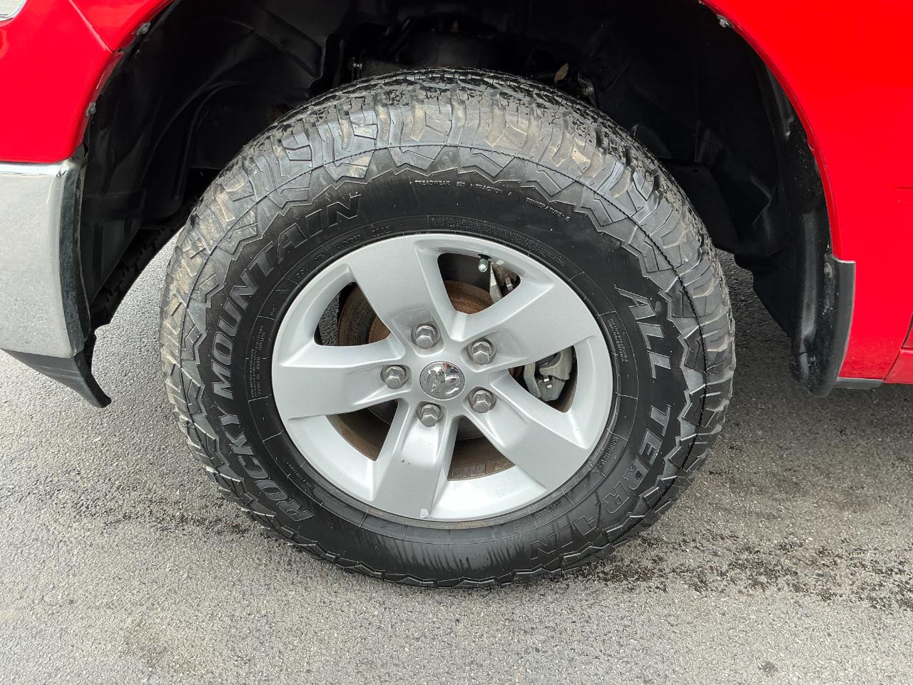 RAM 1500 4WD Quad Cab 140.5" SLT 2014