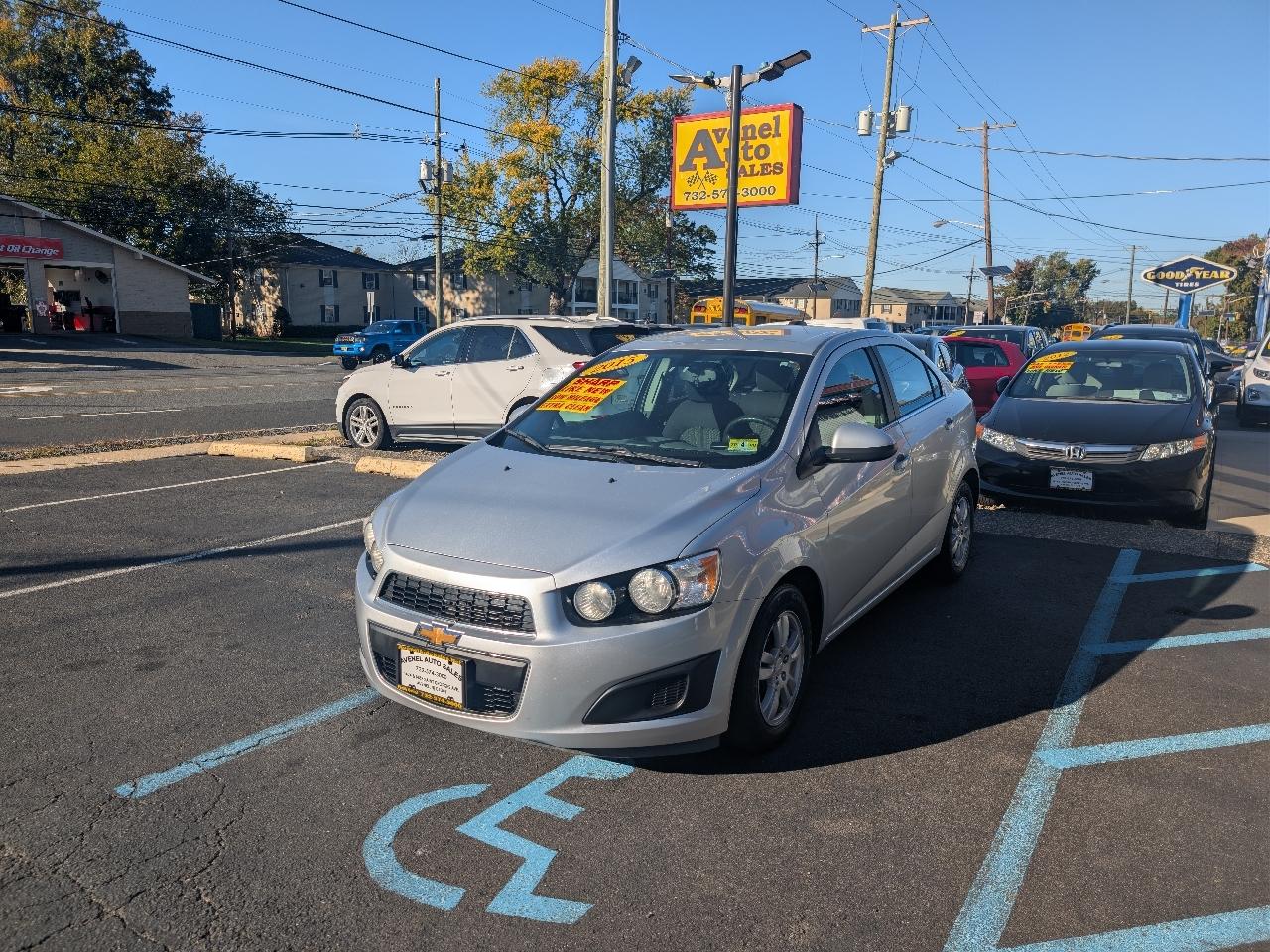 Silver 2015 Chevrolet Sonic Sedan Front-Wheel Drive Automatic