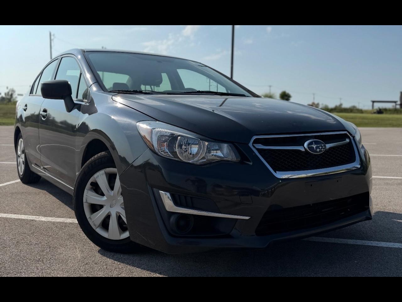 Brown 2015 Subaru Impreza Sedan All-Wheel Drive Automatic