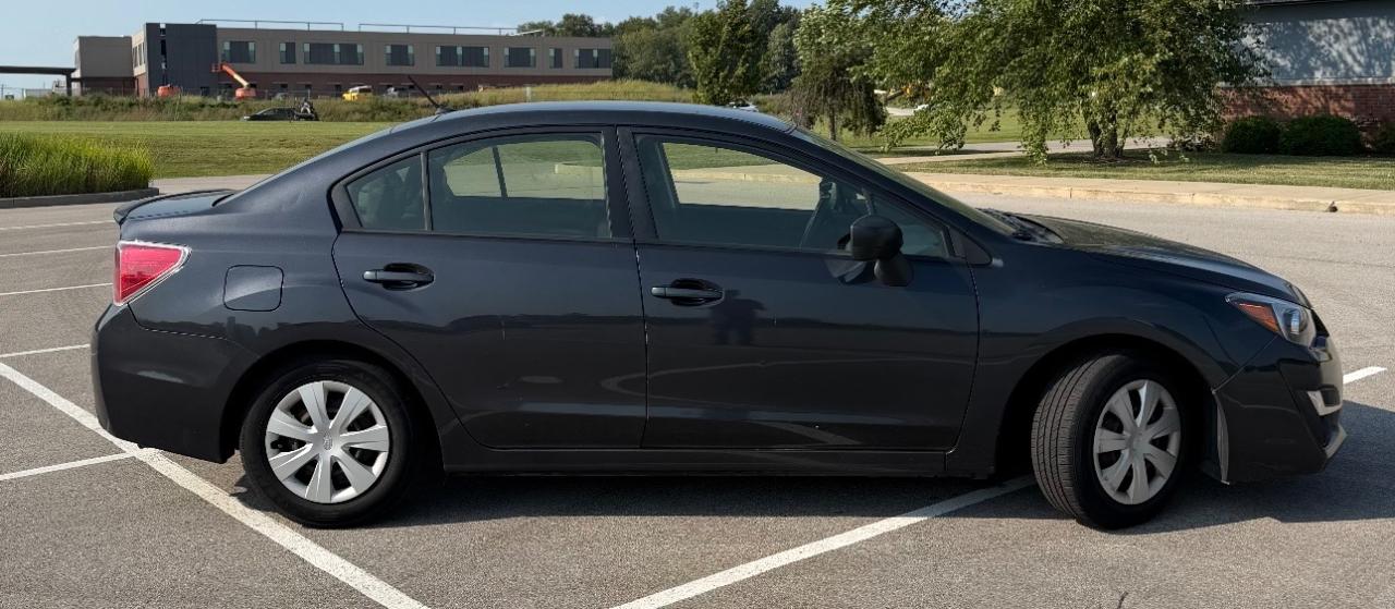 Subaru Impreza Sedan 4dr CVT 2.0i 2015