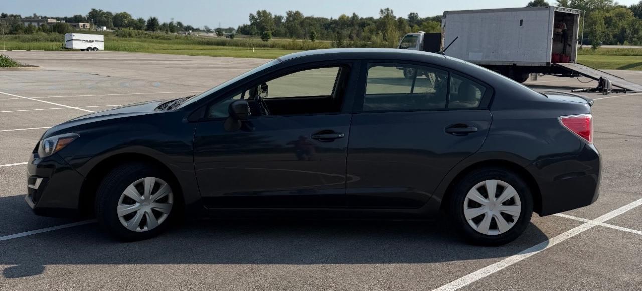 Subaru Impreza Sedan 4dr CVT 2.0i 2015
