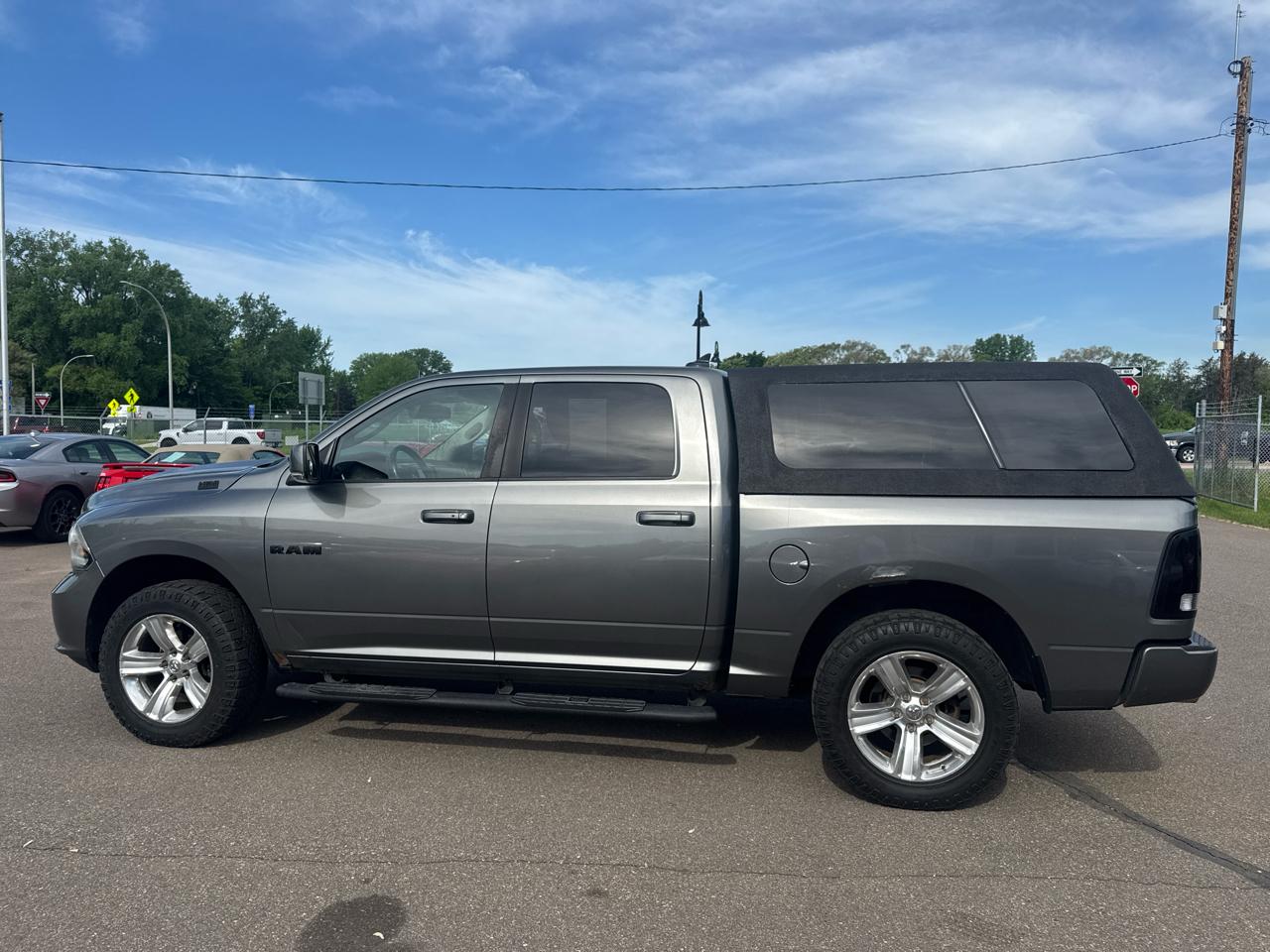 RAM 1500 4WD Crew Cab 140.5" Sport 2013