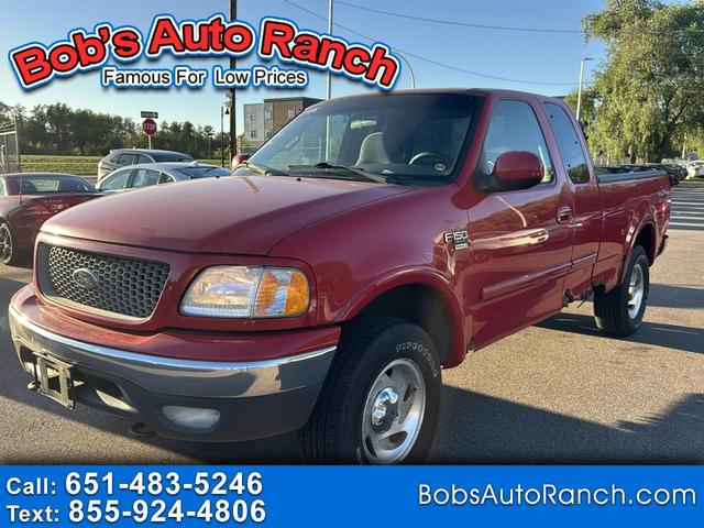 Red 2000 Ford F-150 Pickup Truck Four-Wheel Drive Automatic