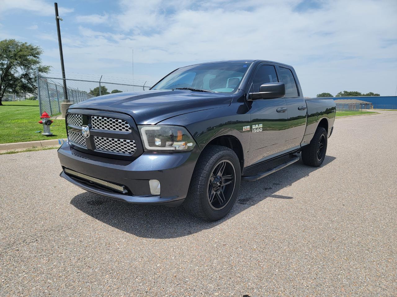 RAM 1500 4WD Quad Cab 140.5" Express 2014