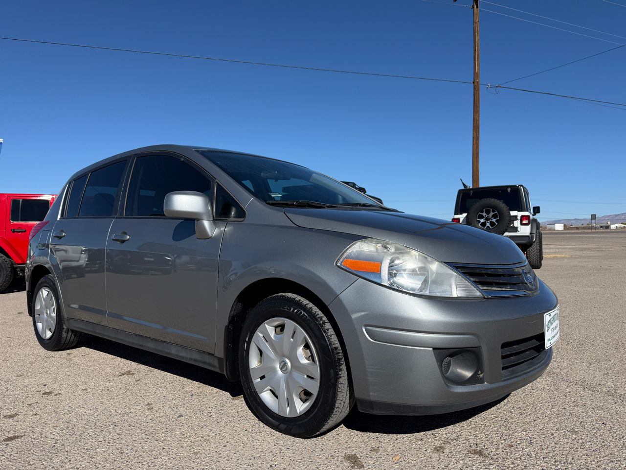 Nissan Versa 5dr HB I4 Auto 1.8 S 2011