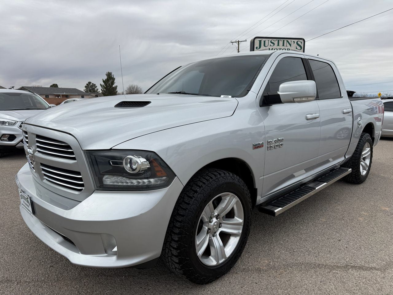 RAM 1500 4WD Crew Cab 140.5" Sport 2013