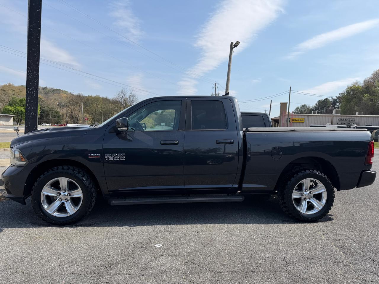 RAM 1500 4WD Quad Cab 140.5" Sport 2014
