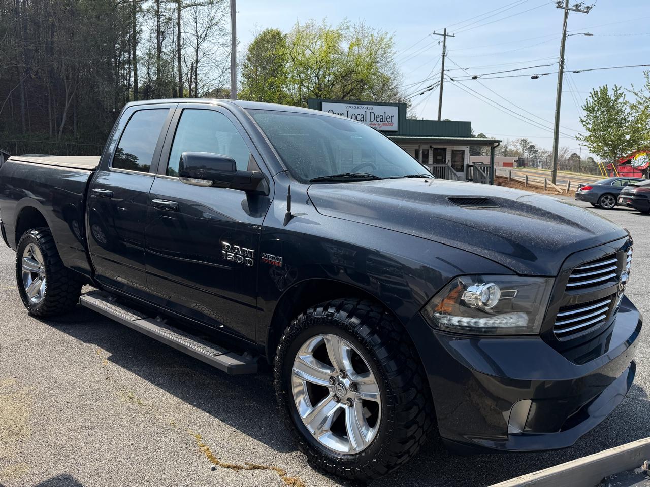 RAM 1500 4WD Quad Cab 140.5" Sport 2014
