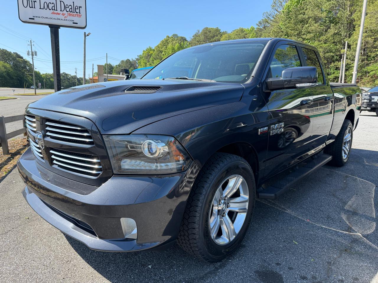 2014 RAM 1500 4WD Quad Cab 140.5" Sport