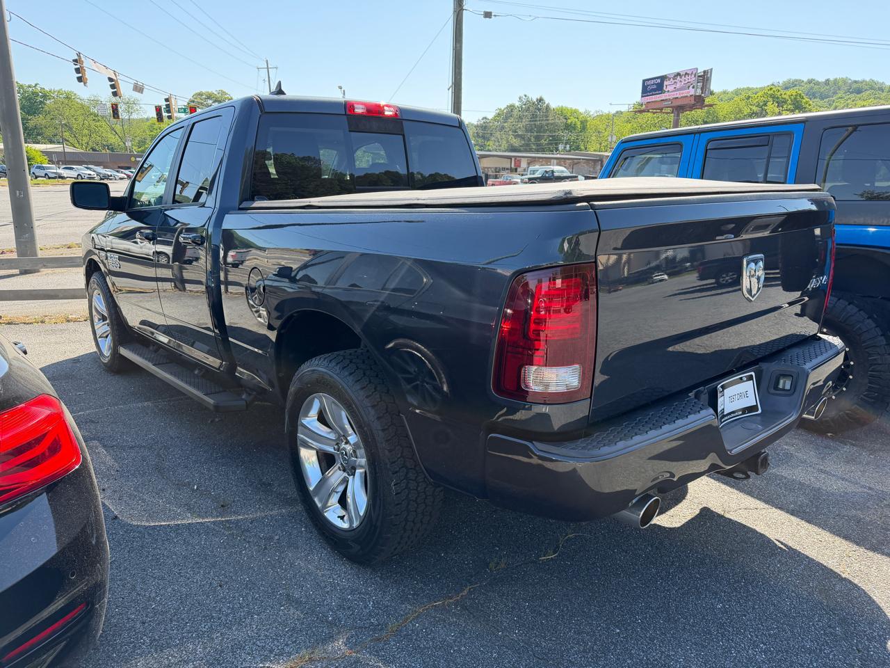 RAM 1500 4WD Quad Cab 140.5" Sport 2014