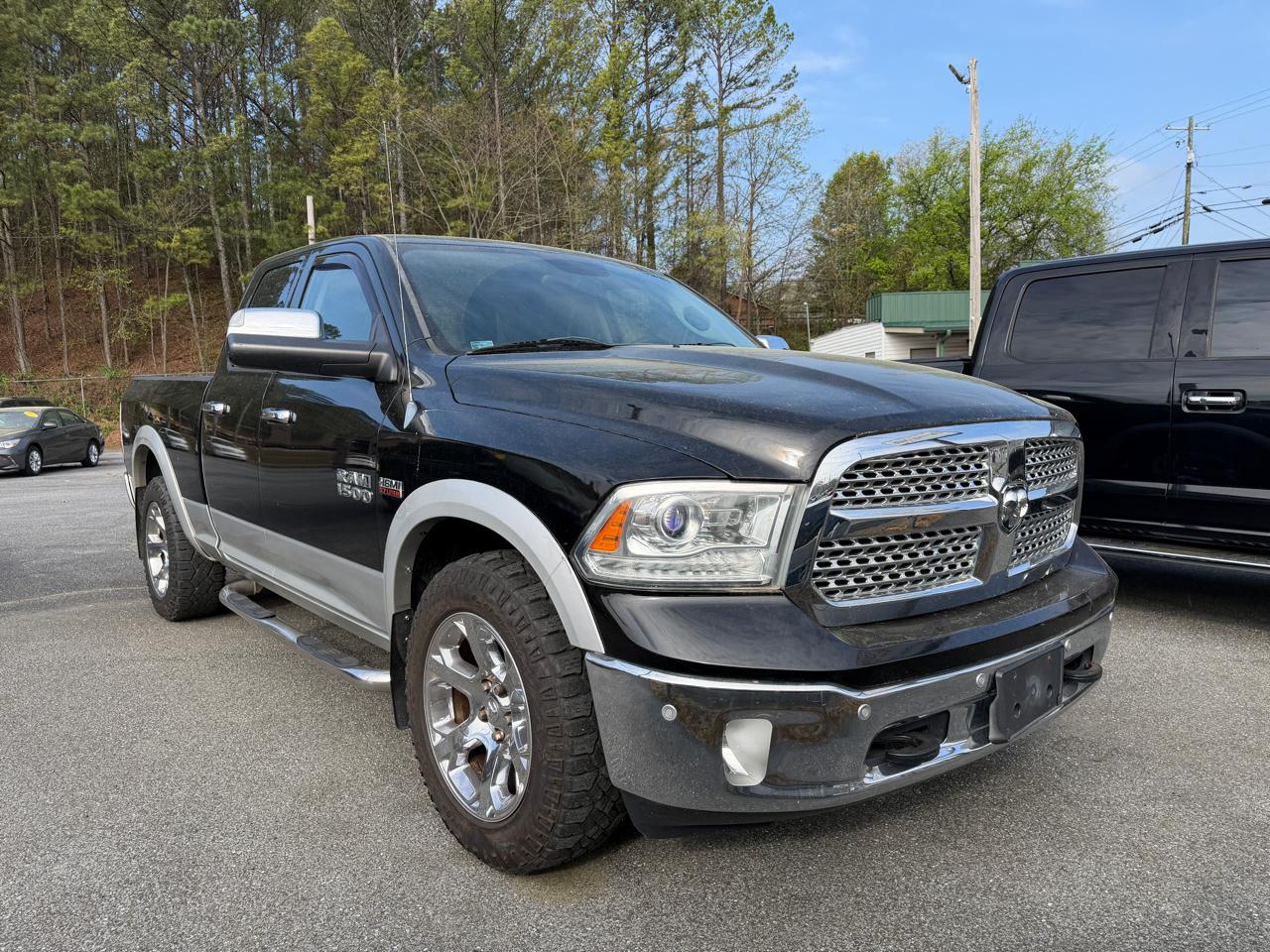 2014 RAM 1500 4WD Quad Cab 140.5" Laramie