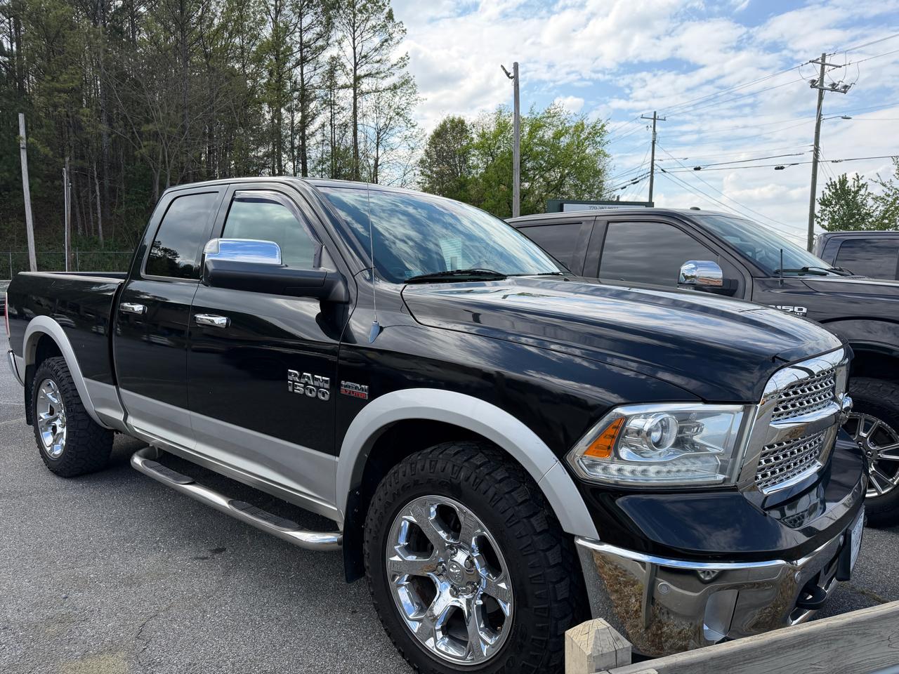 2014 RAM 1500 4WD Quad Cab 140.5" Laramie