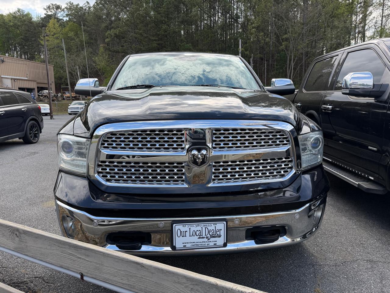 2014 RAM 1500 4WD Quad Cab 140.5" Laramie