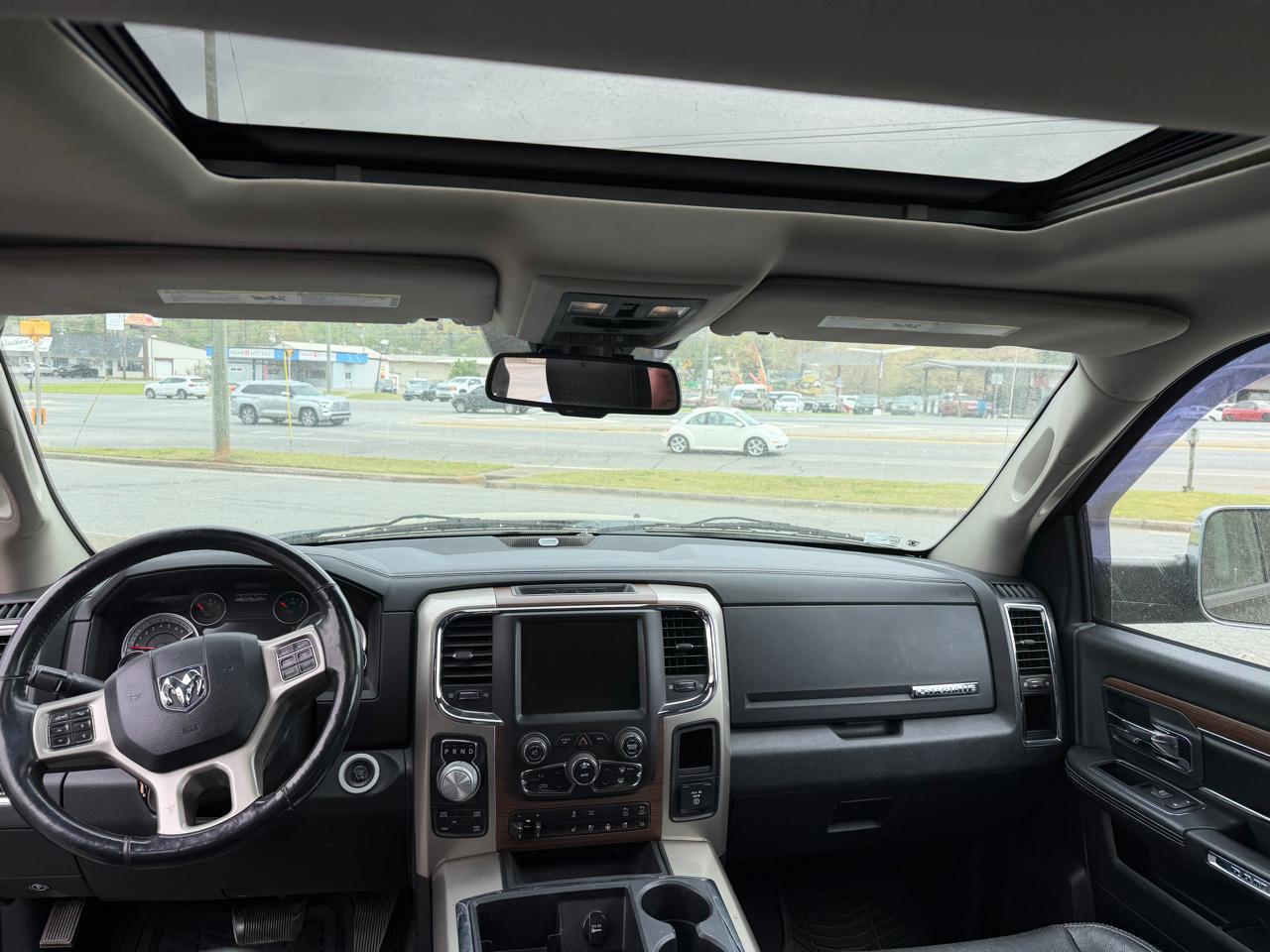 RAM 1500 4WD Quad Cab 140.5" Laramie 2014